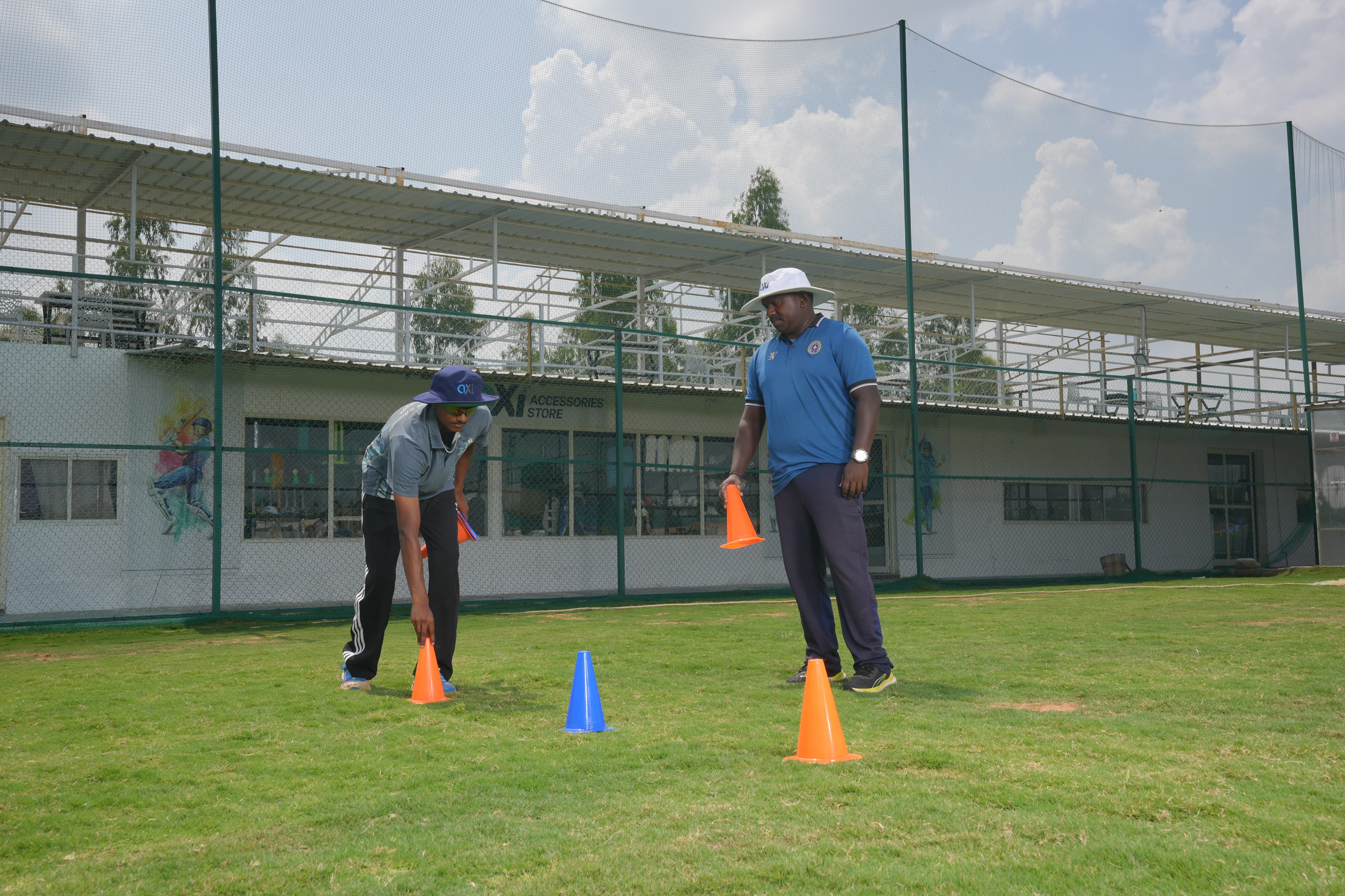 Coach guiding a young player